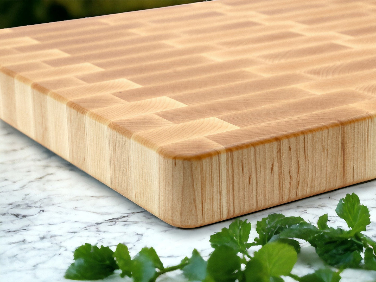Maple end grain cutting board with rounded edges and rich wood grain on Tampa Home & Garden Store