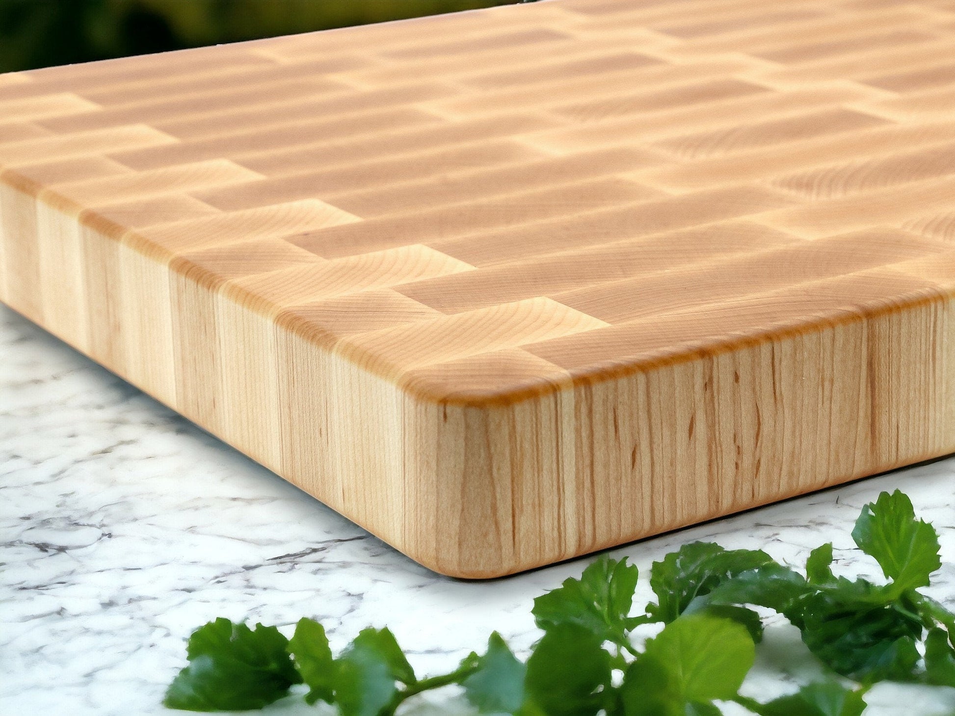 Maple end grain cutting board with rounded edges and rich wood grain on Tampa Home & Garden Store