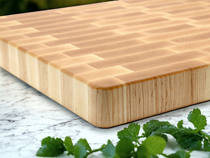 Maple end grain cutting board with rounded edges and rich wood grain on Tampa Home & Garden Store