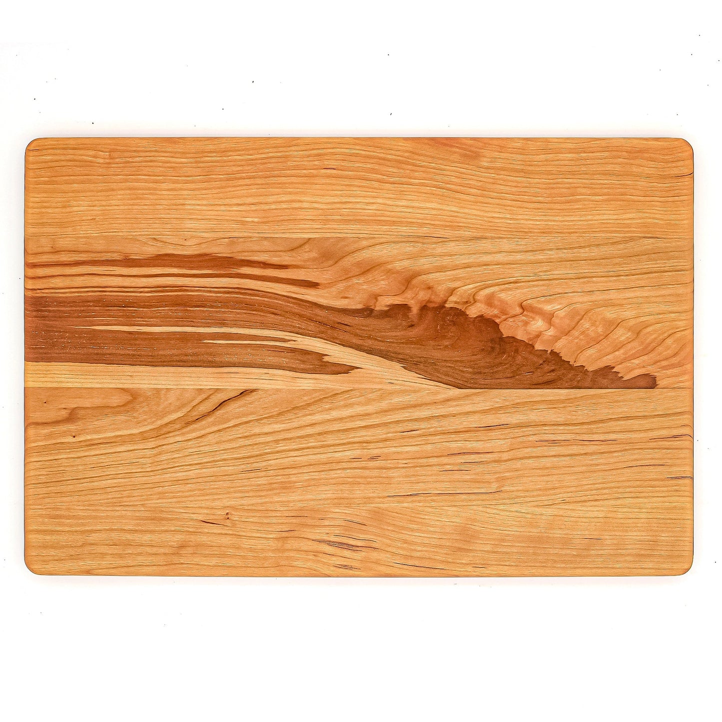 Cherry wood cutting board with rounded corners and rich grain 18 x 12 in on Tampa Home & Garden Store