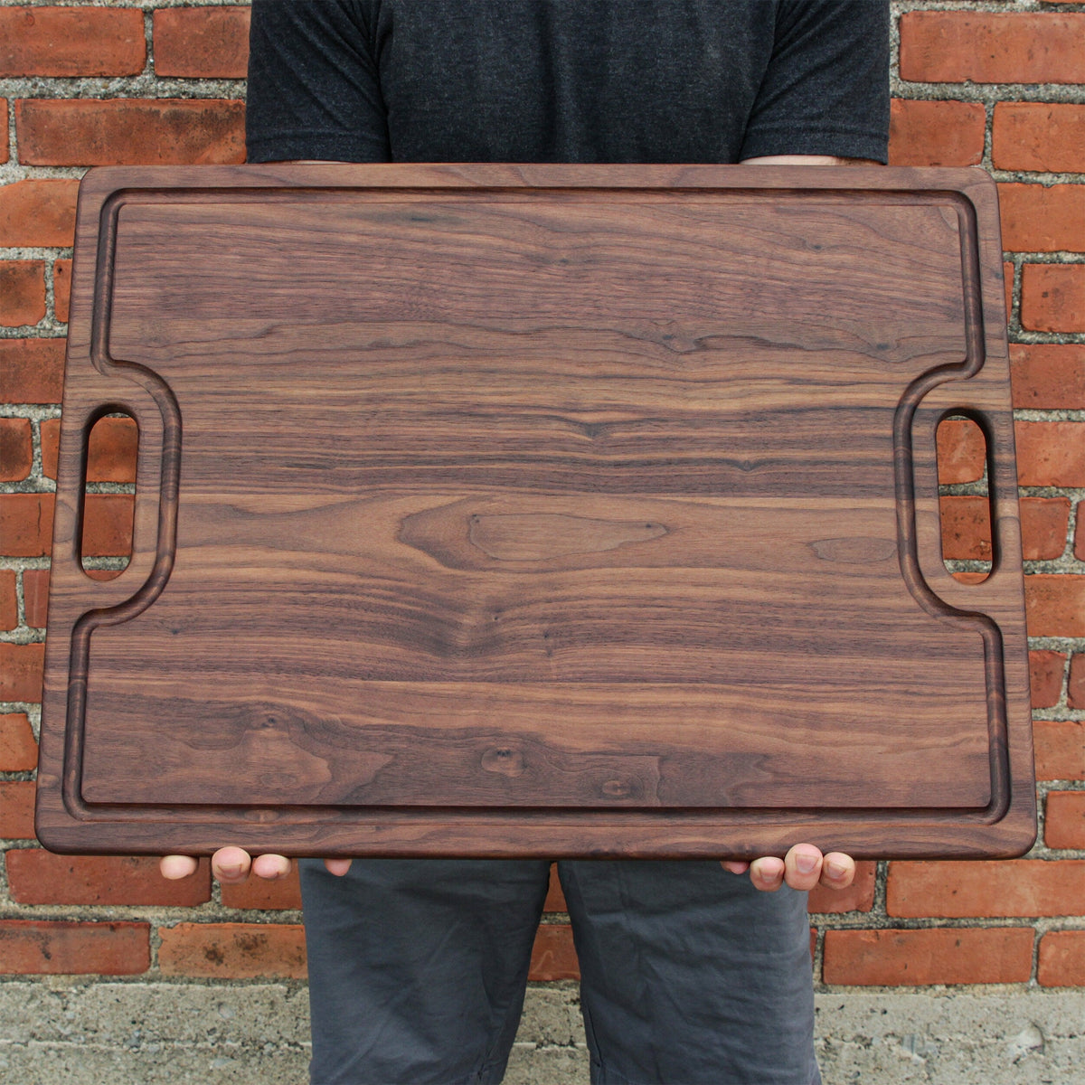 King of the Grill cutting board, dark walnut wood with carved handle cutouts, USA made on Tampa Home & Garden Store