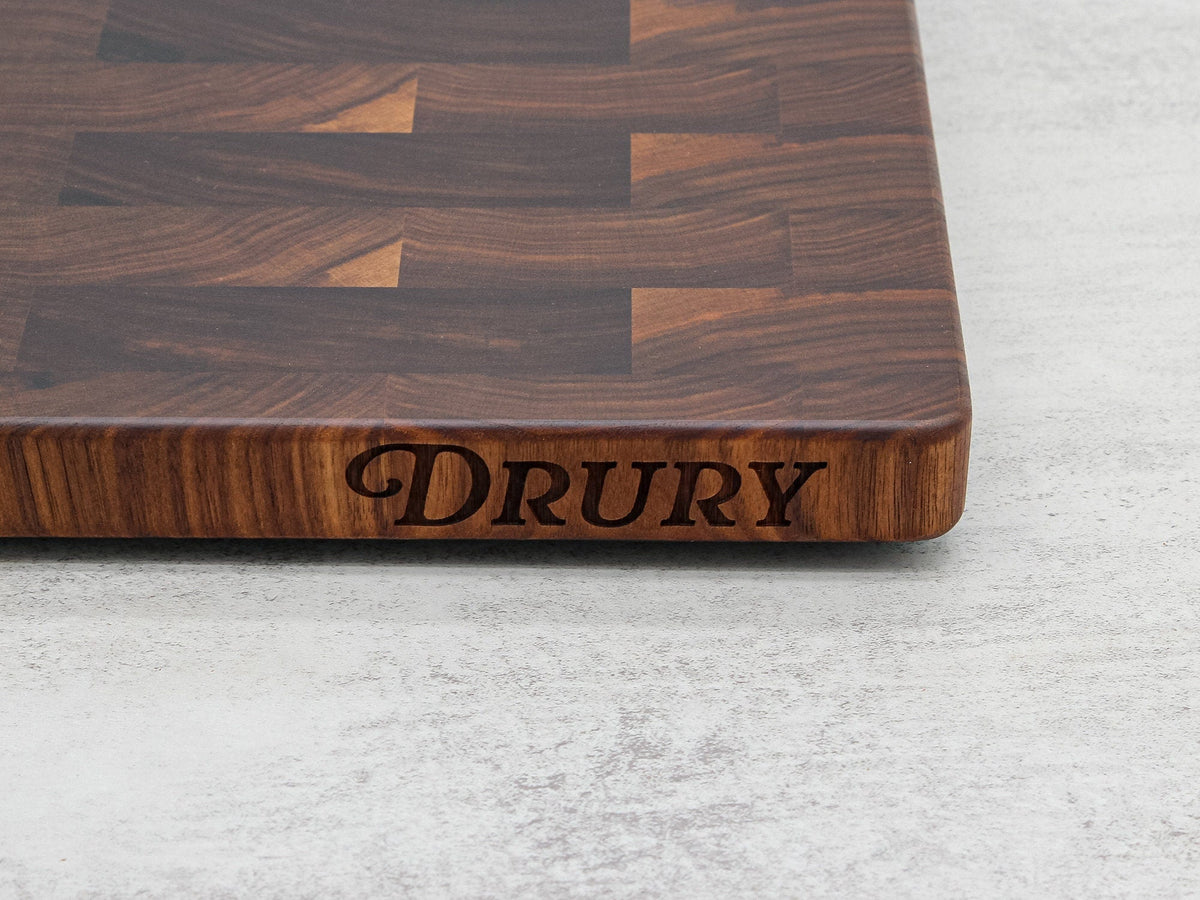 Large walnut end-grain cutting board with edge engraving from Refine Kitchenware on Tampa Home & Garden Store