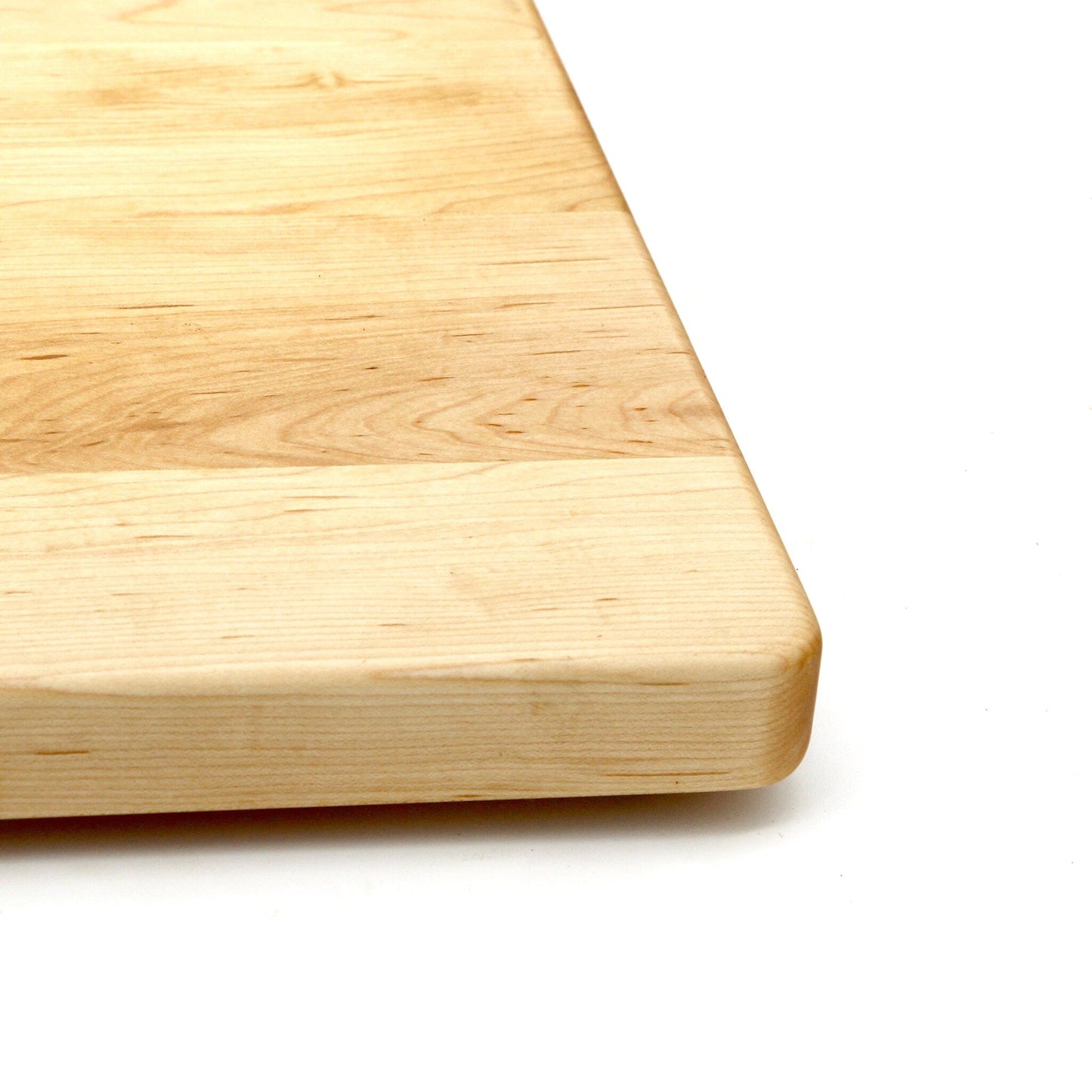 Butcher block cutting board 1.25-inch thick in light maple hardwood with rounded edge on Tampa Home & Garden Store