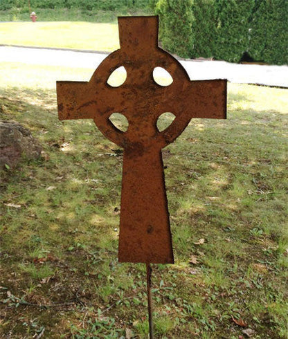 Garden cross metal yard decor with rusted finish and circular cutouts Rustica Ornamentals on Tampa Home & Garden Store