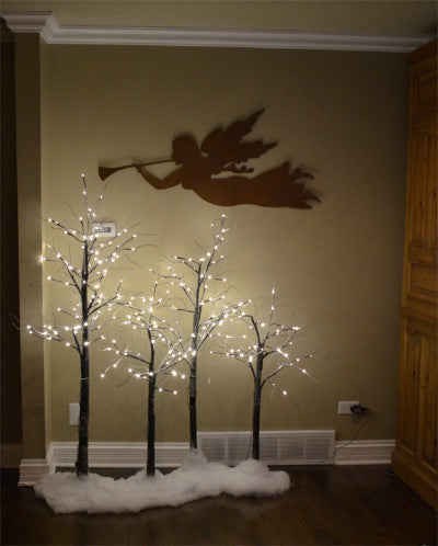 Angel garden stake with LED-lit trees on a snowy base and wall angel silhouette decor on Tampa Home & Garden Store