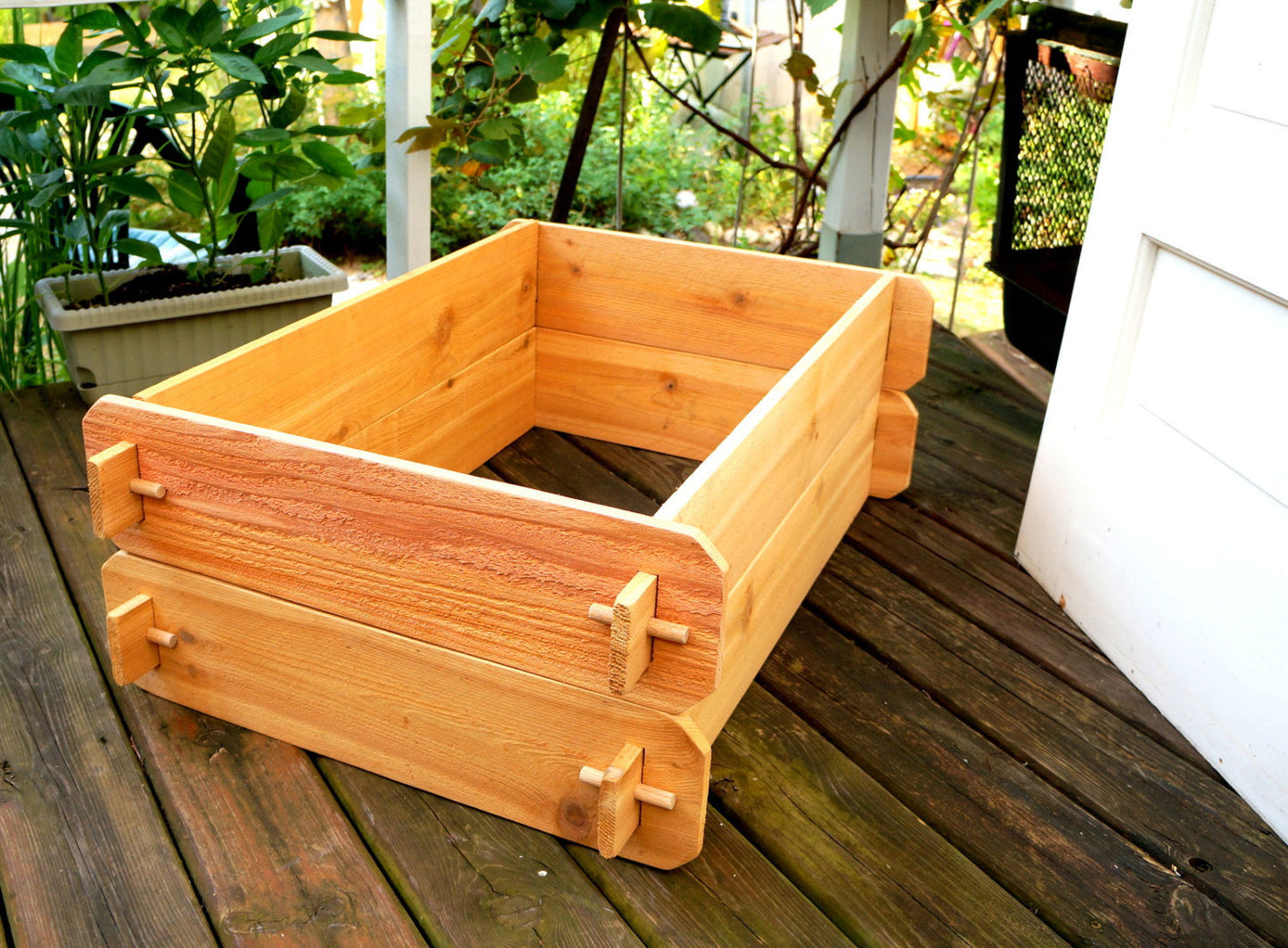Timberlane Gardens raised garden bed kit double deep cedar with two 2x3s on a deck on Tampa Home & Garden Store