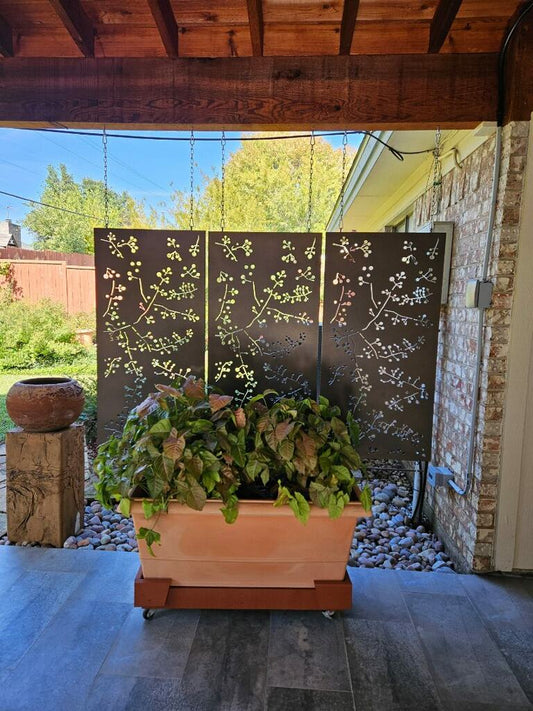 Outdoor metal privacy screen panel (Wattle Twig) by Rustica Ornamentals; steel on planter on Tampa Home & Garden Store
