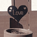 Custom dark heart garden decoration metal sign on a wooden stake by Rustica Ornamentals on Tampa Home & Garden Store