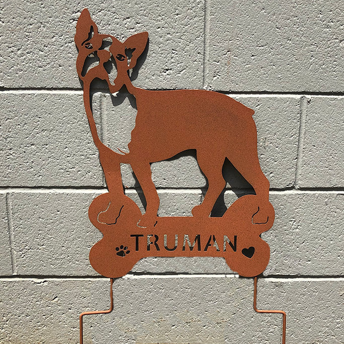 Boston Terrier memorial garden sculpture in rust-colored metal with TRUMAN on a bone base on Tampa Home & Garden Store