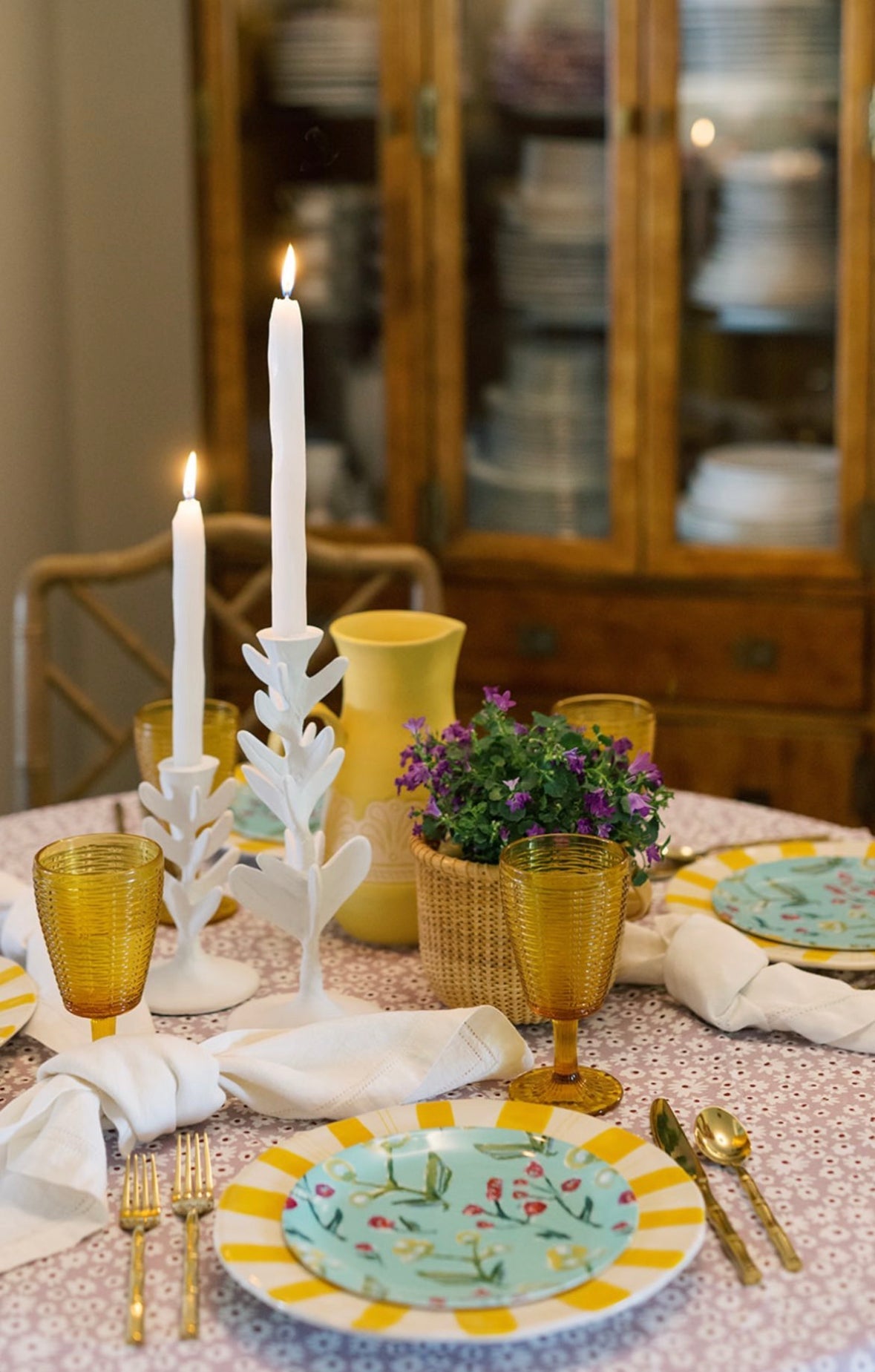 Honeysuckle china plates by Erin Donahue Tice; turquoise floral plates with yellow striped rims on Tampa Home & Garden Store