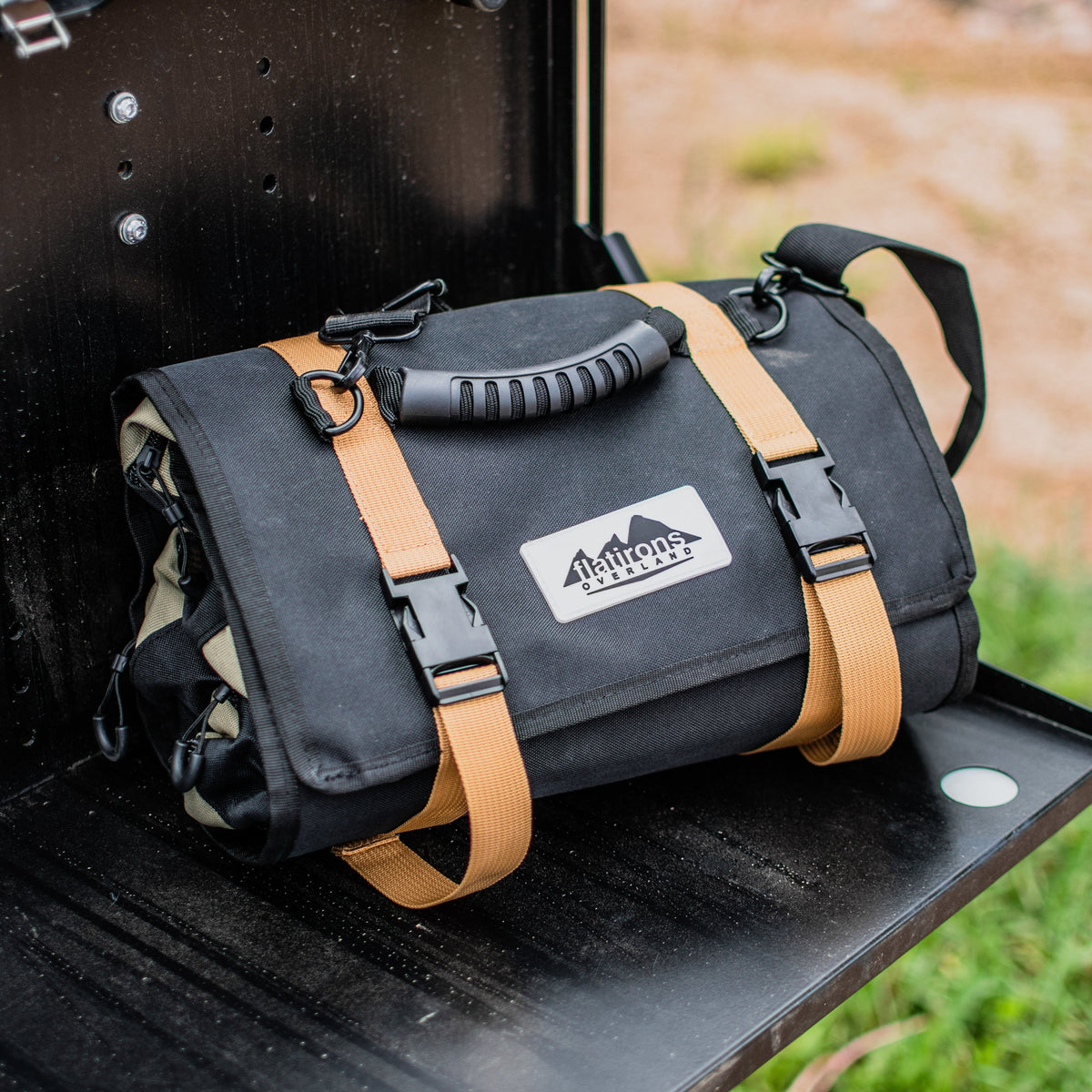 RiPouch Gear Roll by Flatirons Overland, black nylon bag with tan straps on Tampa Home & Garden Store