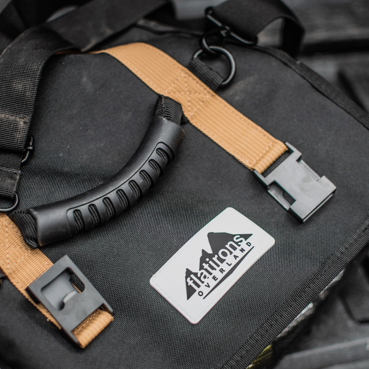 RiPouch Gear Roll by Flatirons Overland, black fabric with tan strap and metal ring on Tampa Home & Garden Store