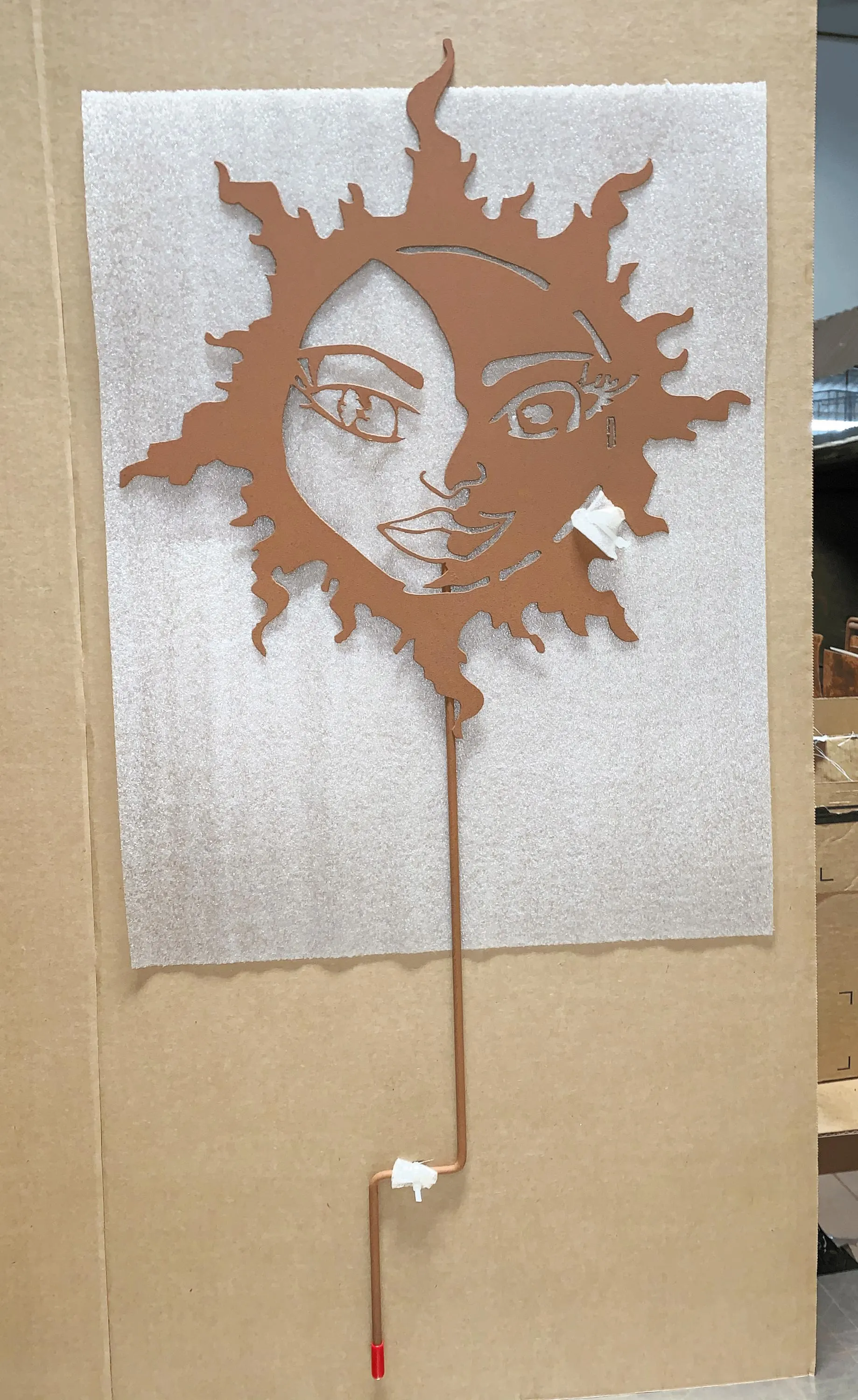 Sun face garden stake by Rustica Ornamentals, rust copper-toned metal sun sculpture for the garden on Tampa Home & Garden Store