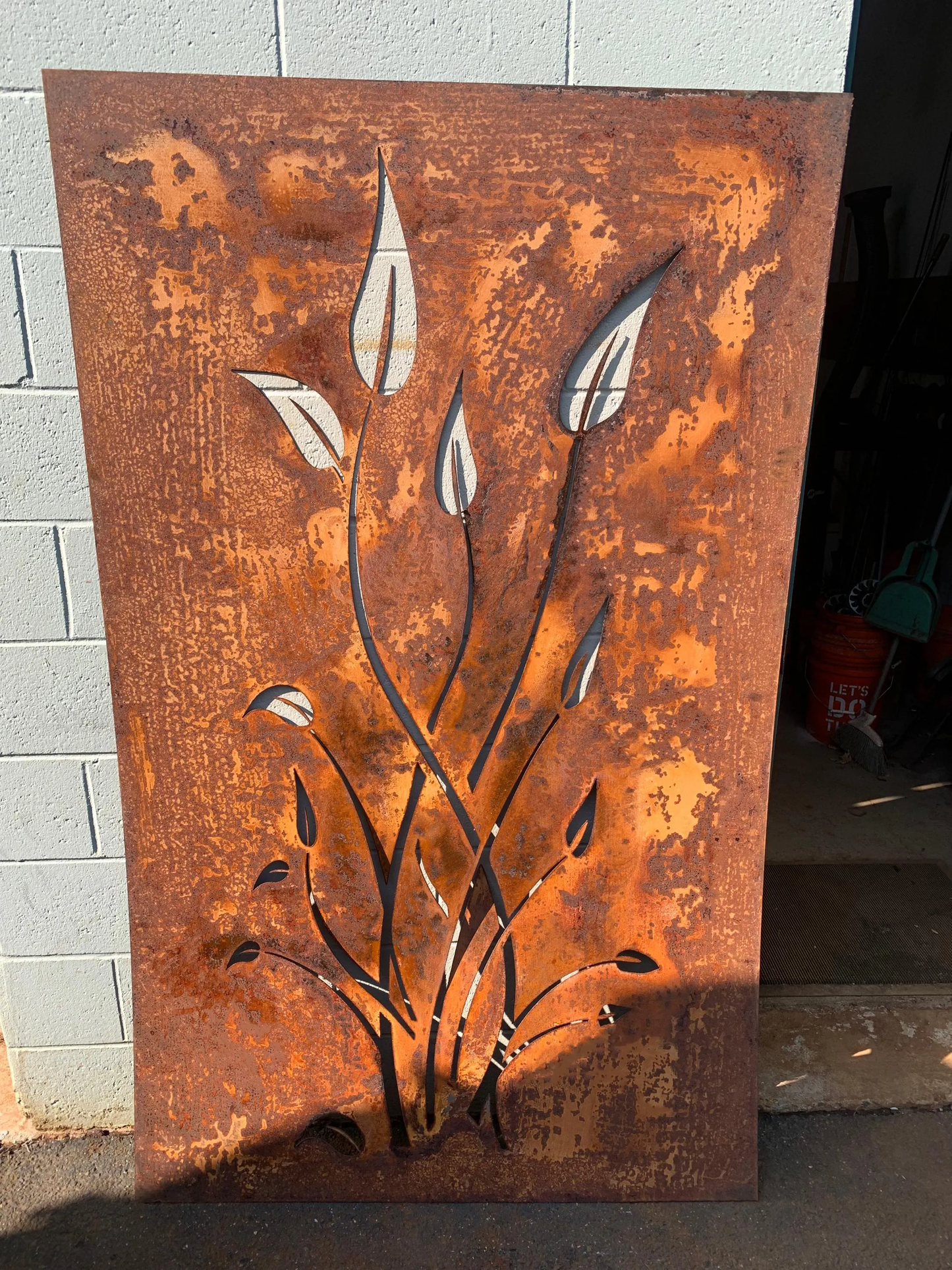 Outdoor metal wall art panel with leaf cutouts, rust patina, 46-inch, Rustica Ornamentals on Tampa Home & Garden Store