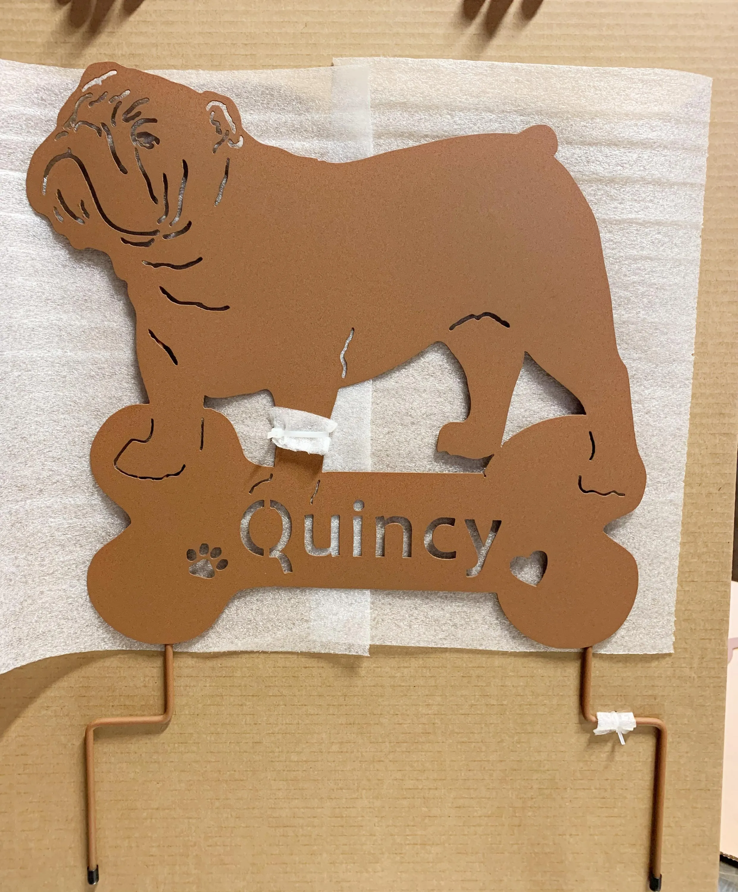Bulldog garden statue wall art in brown metal with Quincy name cutout on Tampa Home & Garden Store