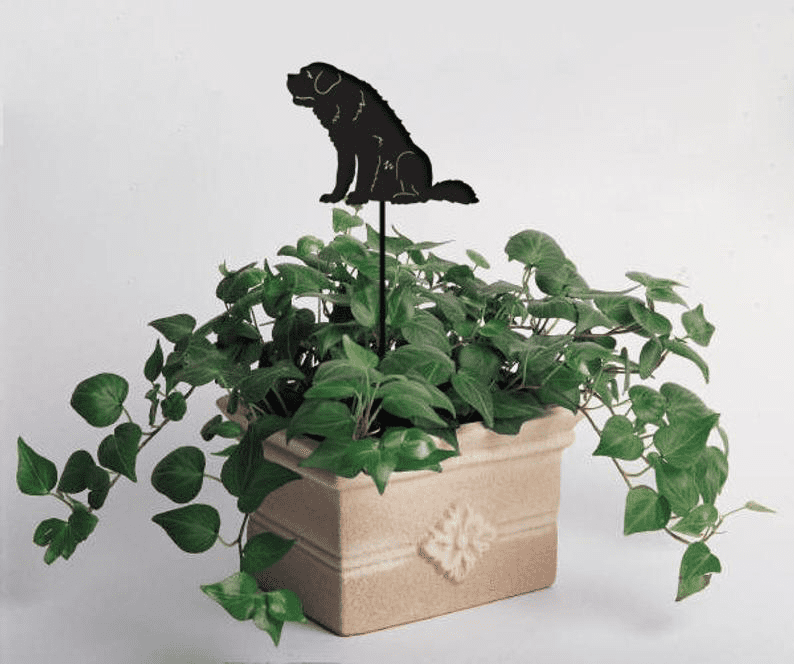 St Bernard plant stake by Rustica Ornamentals, black silhouette atop a beige planter on Tampa Home & Garden Store