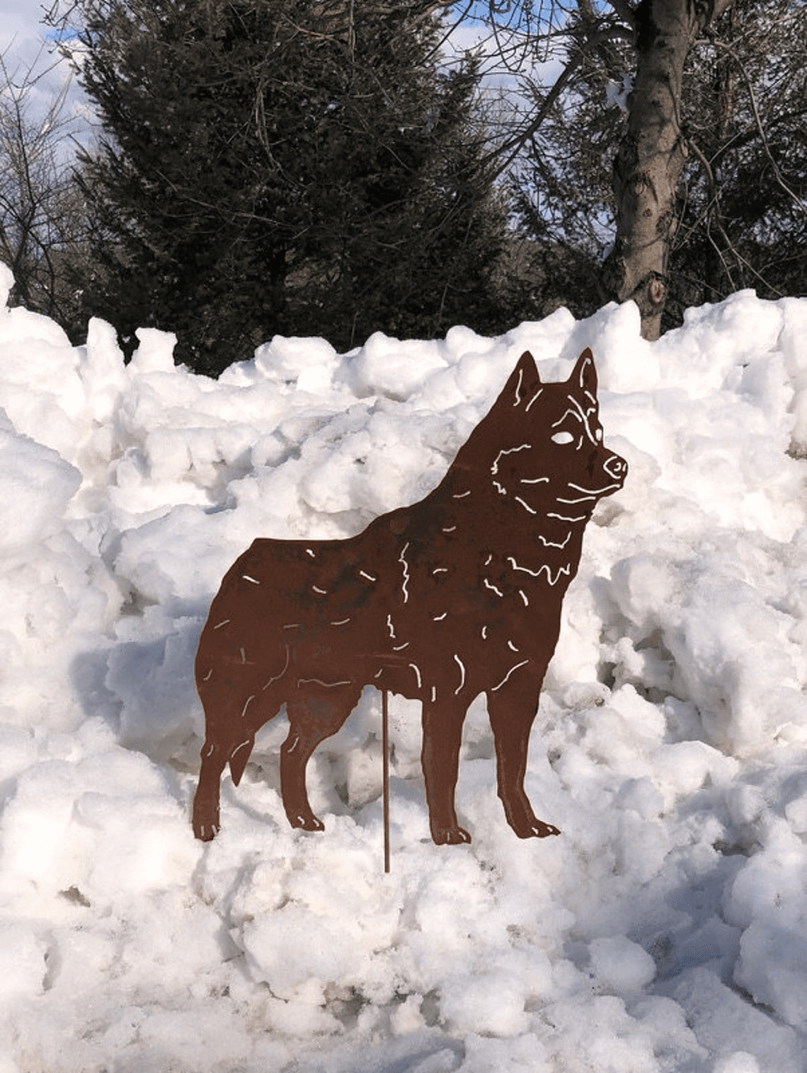 Siberian Husky garden stake by Rustica, brown metal silhouette with white accents in snow on Tampa Home & Garden Store
