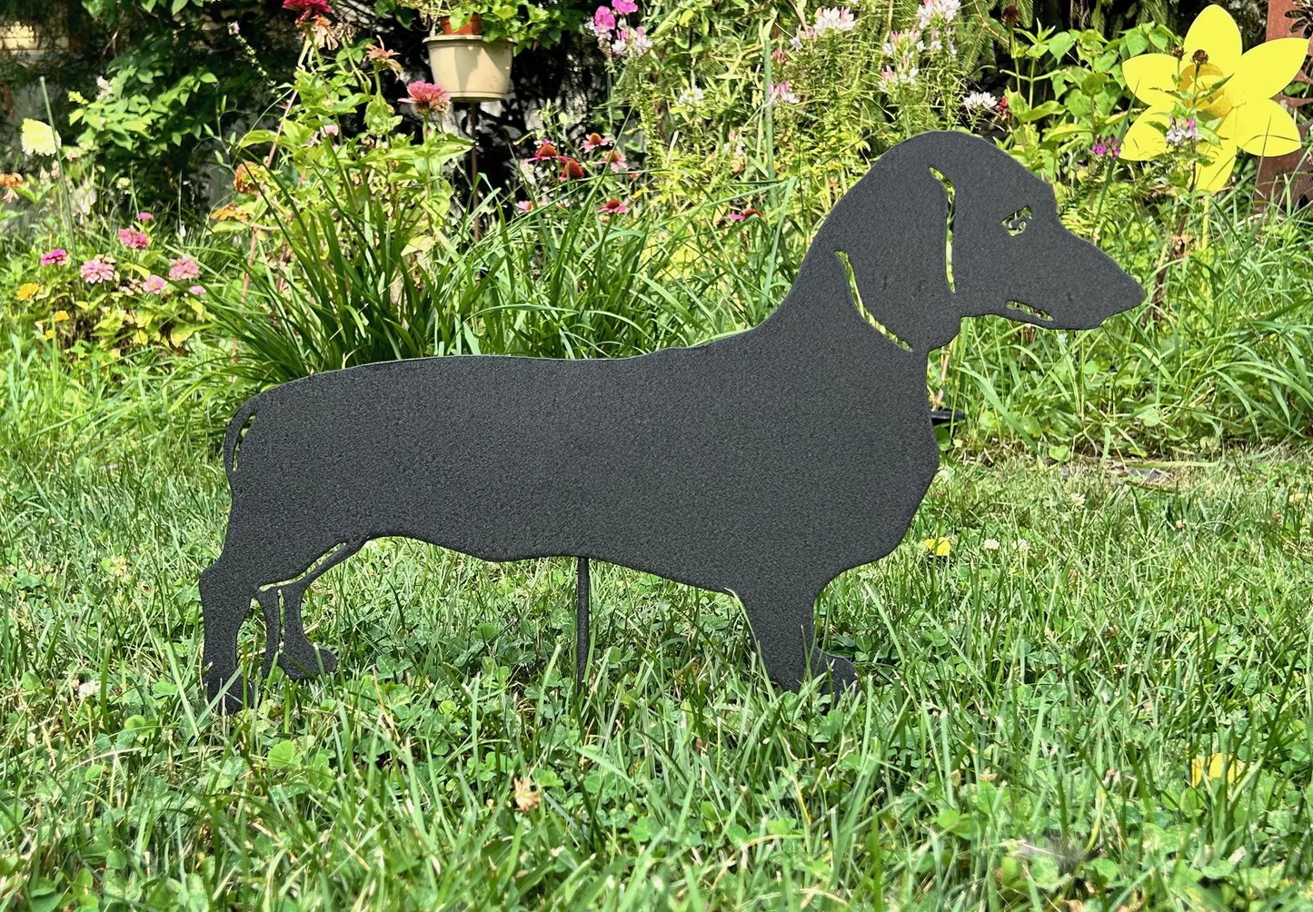 Dachshund lawn statue in dark metal silhouette for garden decor on Tampa Home & Garden Store