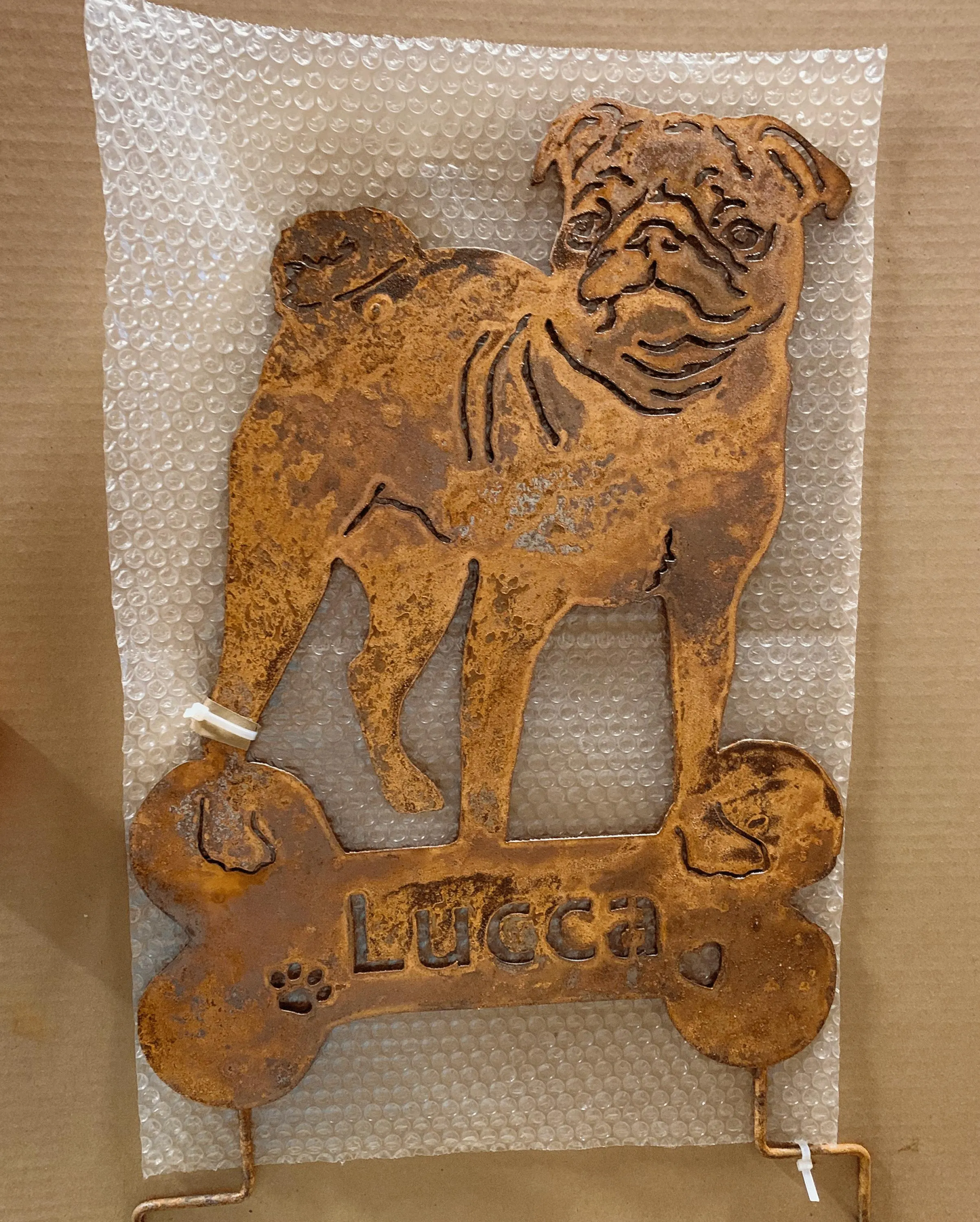 Pug garden stake wall hanging in rustic rusted brown metal by Rustica Ornamentals lawn ornament on Tampa Home & Garden Store