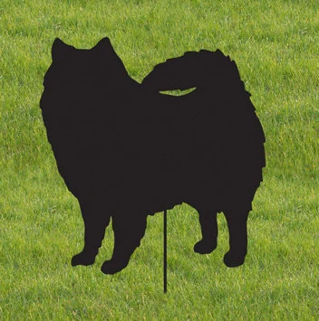 American Eskimo Dog garden stake or wall hanging silhouette with metal stake on green lawn on Tampa Home & Garden Store