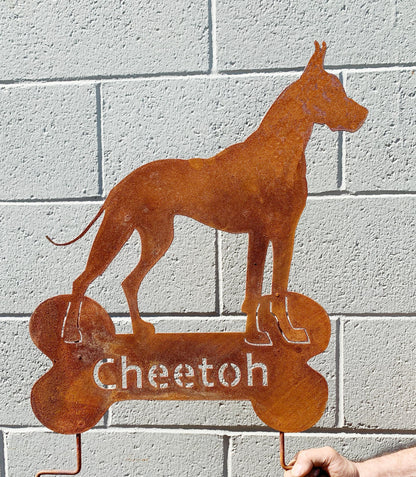 Rusty orange metal Great Dane garden stake silhouette with ball motif, wall hanger ornament on Tampa Home & Garden Store