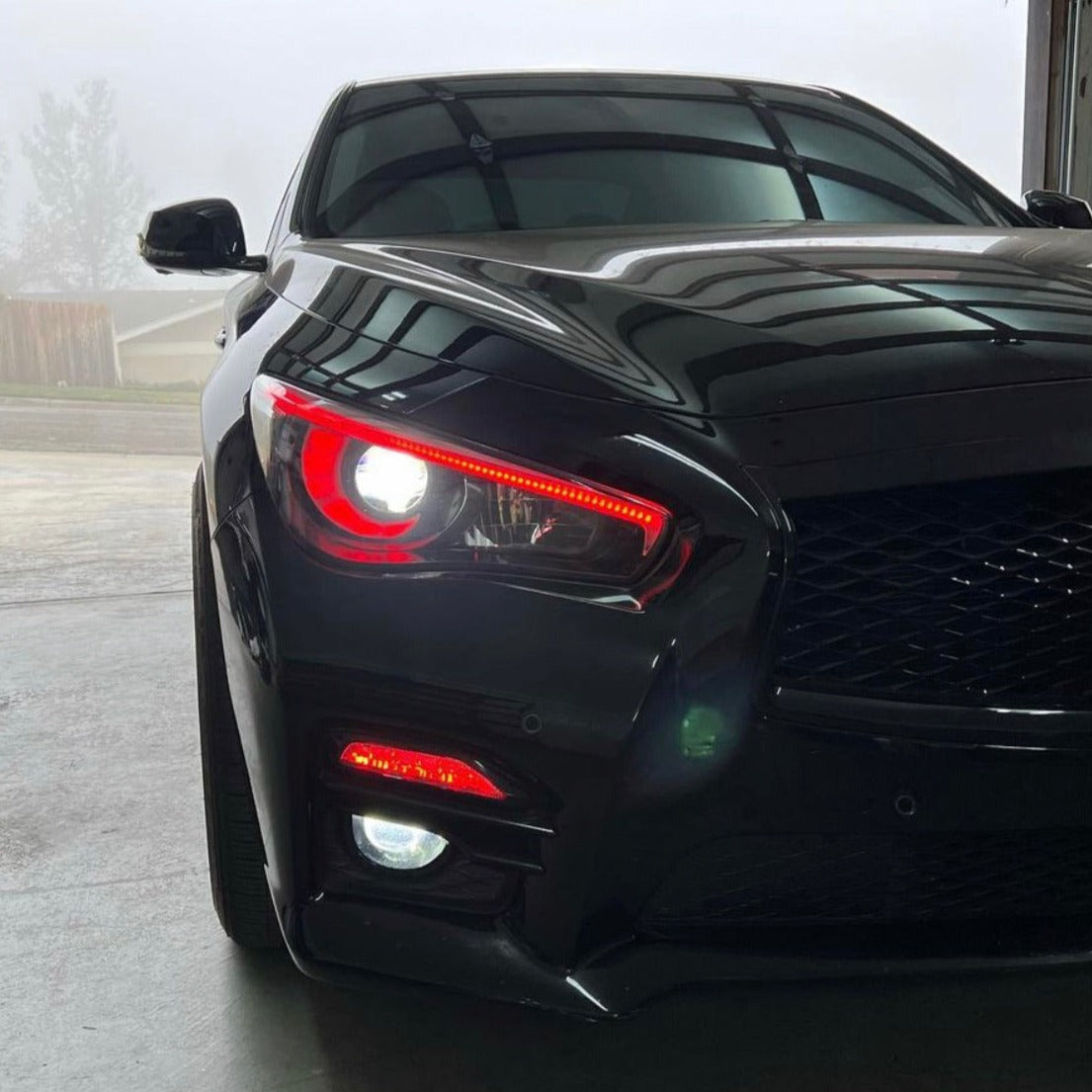Infiniti Q50 RGBW DRL boards 2014-24, front light with red DRL strip on a black car on Tampa Home & Garden Store
