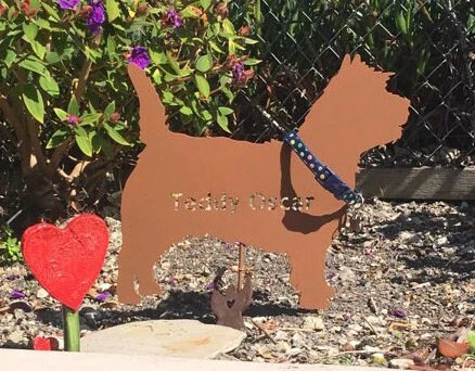 Two garden stakes: Cairn Terrier rust silhouette with blue collar by Rustica Ornamentals on Tampa Home & Garden Store