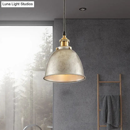 Black Dome Pendant Lamp by Decorbites with an aged silver dome and brass top, warm glow on Tampa Home & Garden Store
