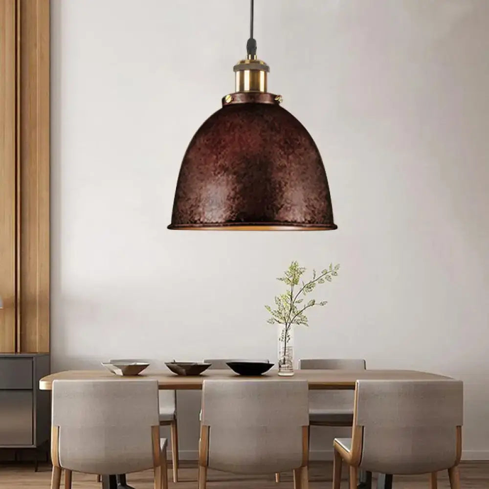 Black Dome Pendant Lamp with hammered-metal shade and brass hardware over a dining table on Tampa Home & Garden Store