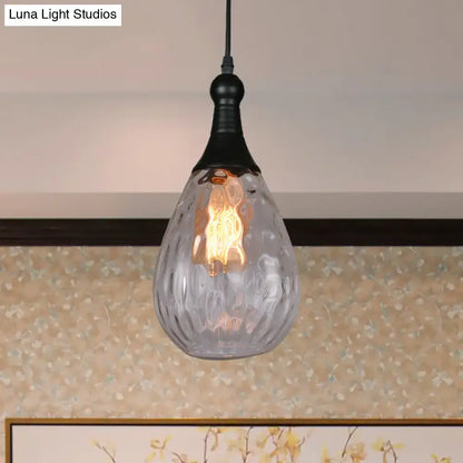 Smoked glass pendant light by Decorbites with teardrop shape and warm Edison glow on Tampa Home & Garden Store