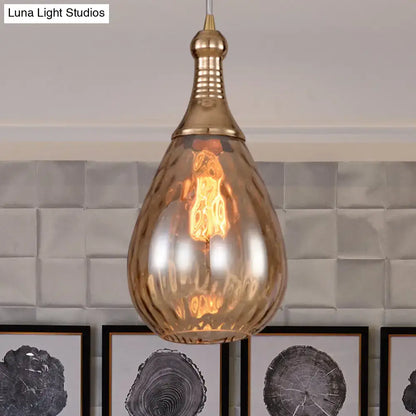 Smoked glass pendant light, copper-toned teardrop filament bulb, Decorbites pendant lights on Tampa Home & Garden Store