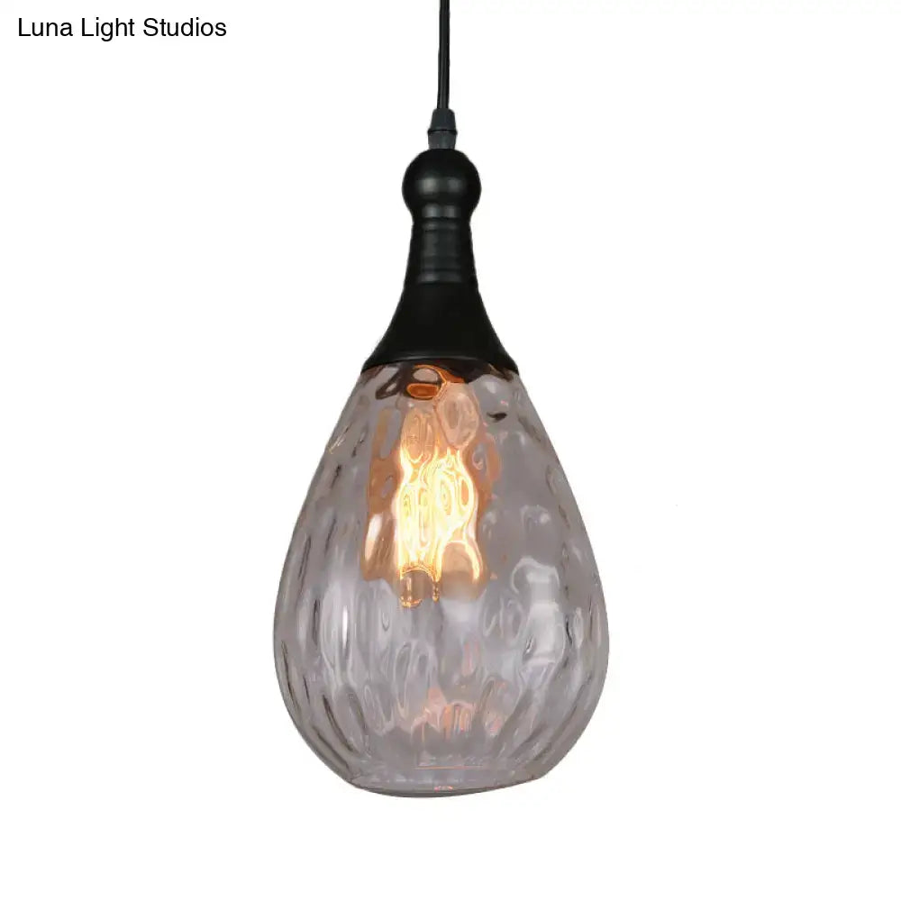 Smoked glass pendant light, teardrop shade with black hardware and Edison bulb on Tampa Home & Garden Store