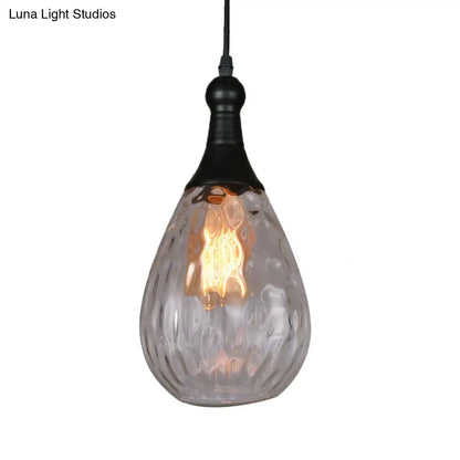 Smoked glass pendant light, teardrop shade with black hardware and Edison bulb on Tampa Home & Garden Store