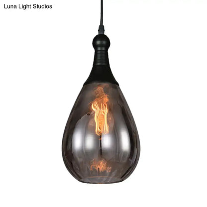 Smoked glass pendant light with black top, teardrop shade and vintage filament bulb on Tampa Home & Garden Store