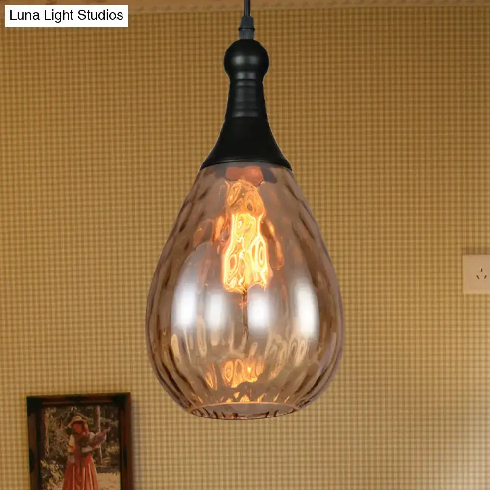 Smoked glass pendant light with teardrop shade and exposed Edison bulb Decorbites Pendant Lights on Tampa Home & Garden Store
