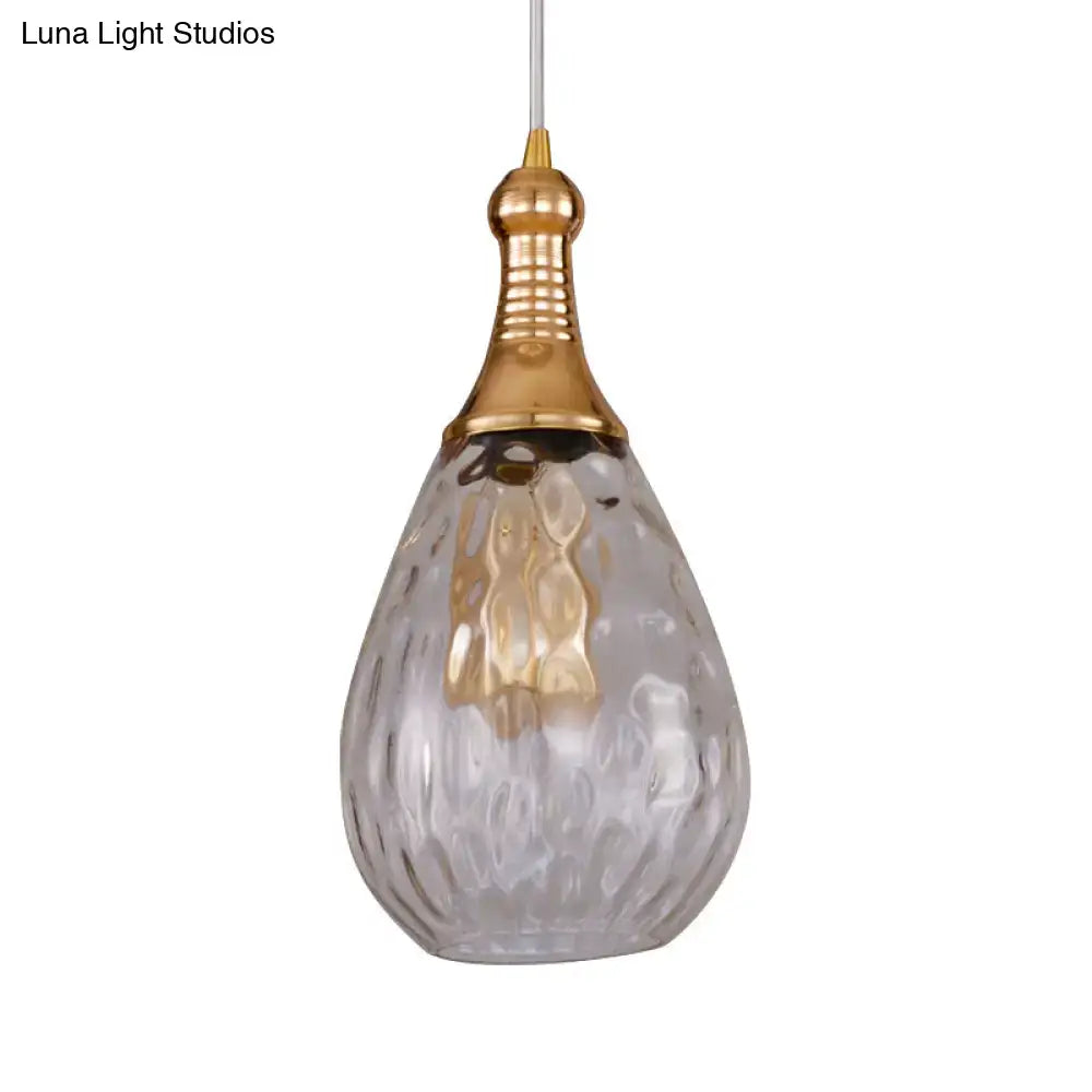 Smoked glass teardrop pendant light with brass top by Decorbites (Luna Light Studios) on Tampa Home & Garden Store