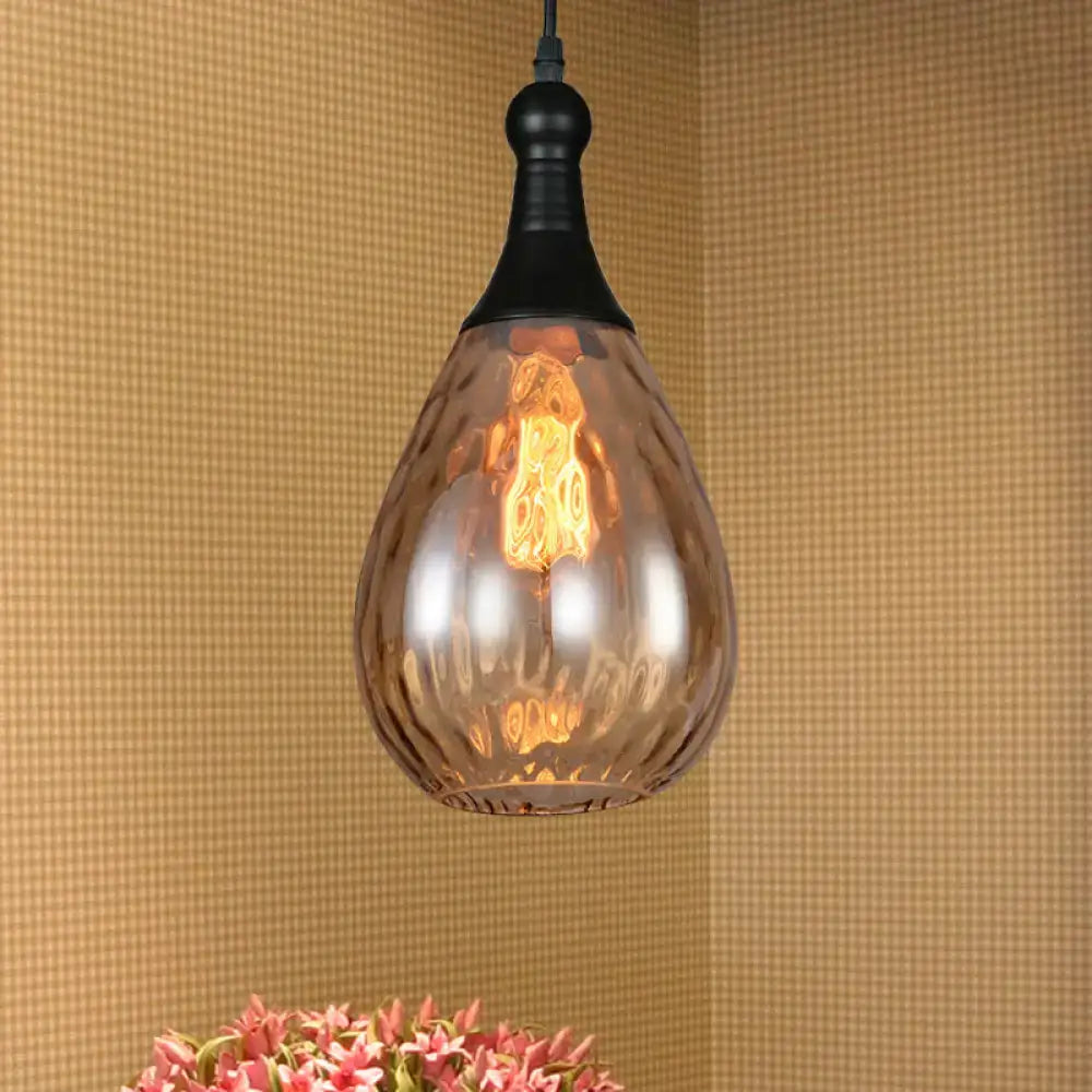 Smoked glass pendant light with teardrop shape and black hardware, Decorbites on Tampa Home & Garden Store