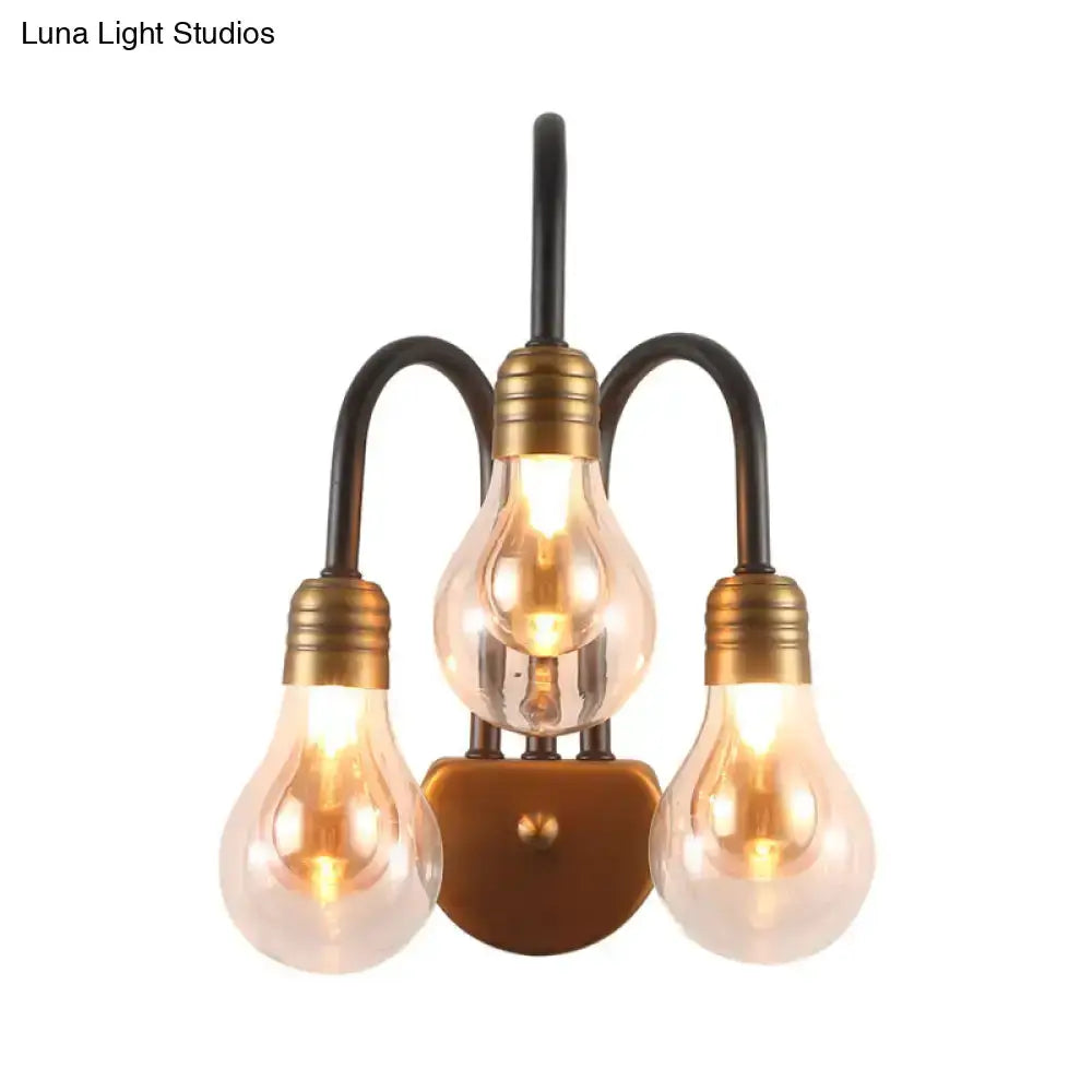 Industrial black & brass wall lamp with three bulbs, black arms, brass sockets Decorbites on Tampa Home & Garden Store