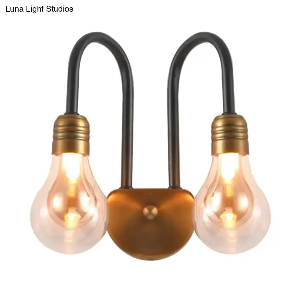 Industrial black & brass wall lamp by Decorbites with two Edison bulbs on Tampa Home & Garden Store