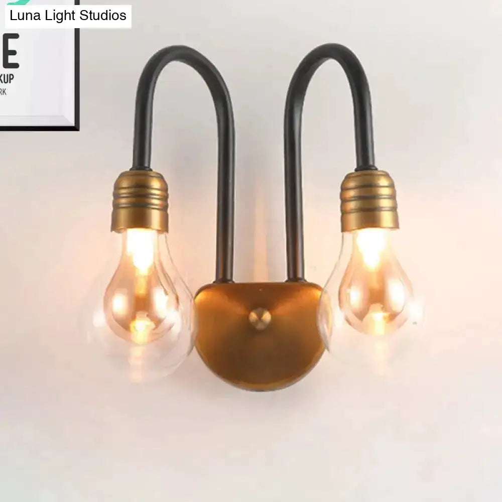 Industrial black & brass two-bulb wall lamp by Decorbites with Edison bulbs for bedroom on Tampa Home & Garden Store
