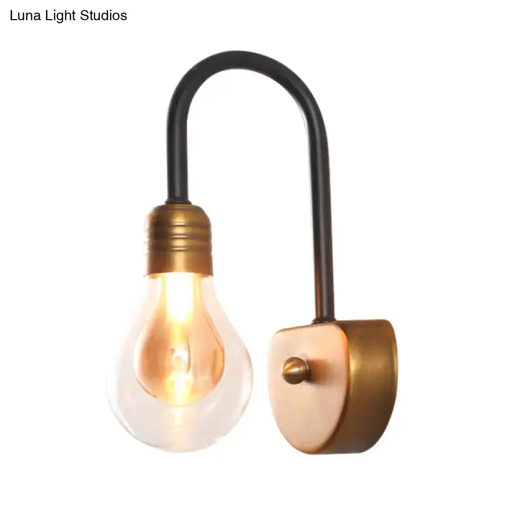 Industrial wall lamp black curved arm with brass socket and exposed LED bulb by Decorbites on Tampa Home & Garden Store