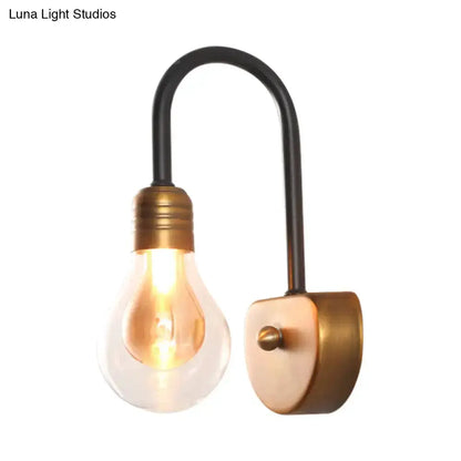 Industrial wall lamp black curved arm with brass socket and exposed LED bulb by Decorbites on Tampa Home & Garden Store