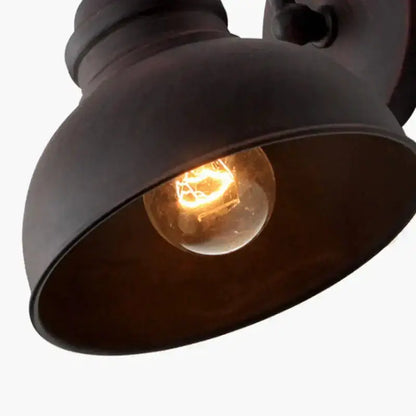 Industrial black metal outdoor wall lamp dome sconce with warm Edison bulb on Tampa Home & Garden Store