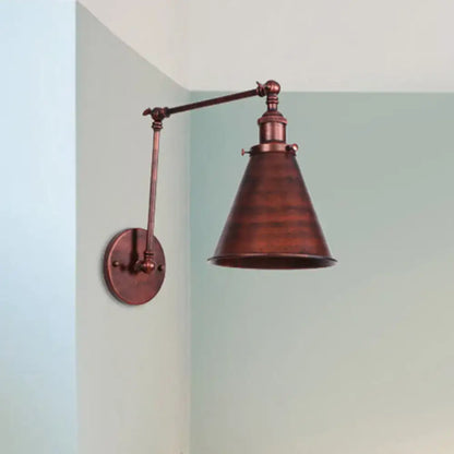 Rust black cone wall sconce with adjustable swing arm, coppery metal finish on Tampa Home & Garden Store