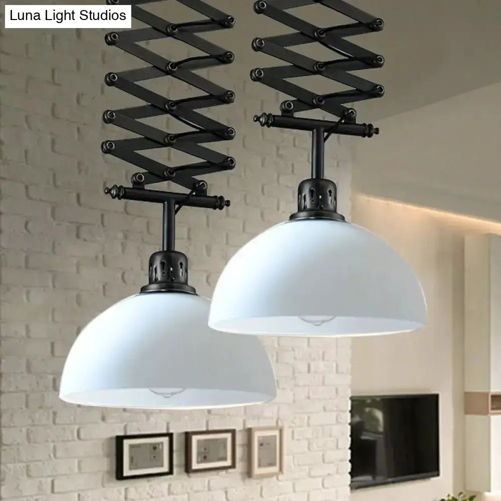 Industrial black & white pendant lights with dual white dome shades and scissor-arm suspension on Tampa Home & Garden Store