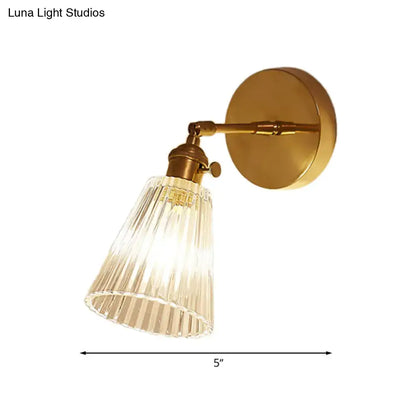 Brass textured glass wall sconce by Decorbites with ribbed conical shade and round backplate on Tampa Home & Garden Store