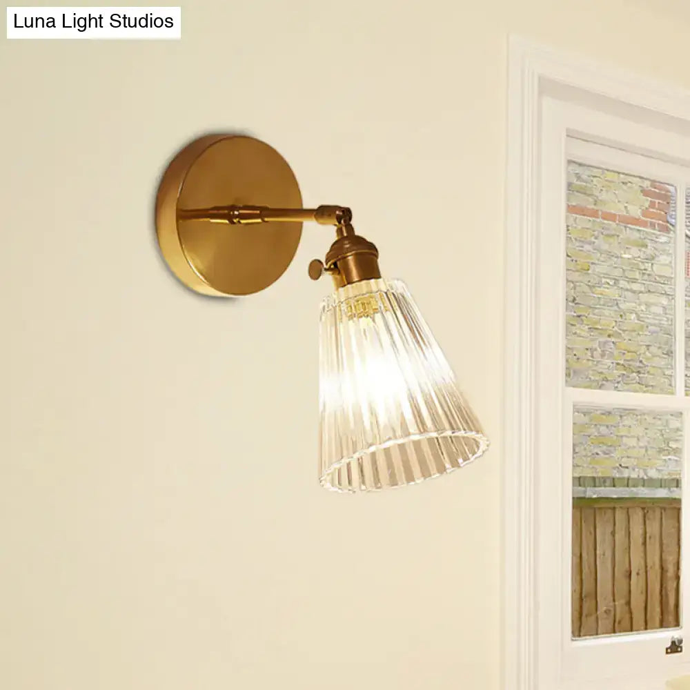 Brass textured glass wall sconce with ribbed shade on round backplate by Decorbites on Tampa Home & Garden Store