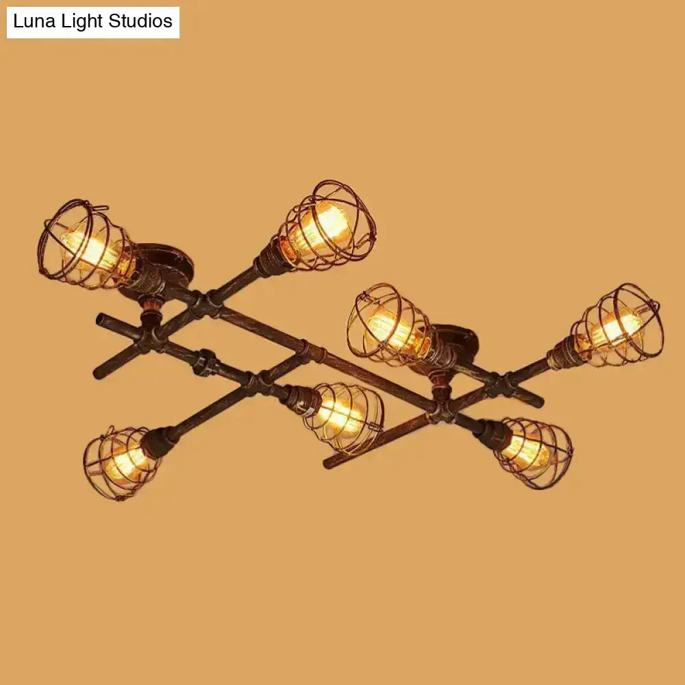 Brass piping ceiling light by Decorbites with exposed Edison bulbs in wire cages on Tampa Home & Garden Store