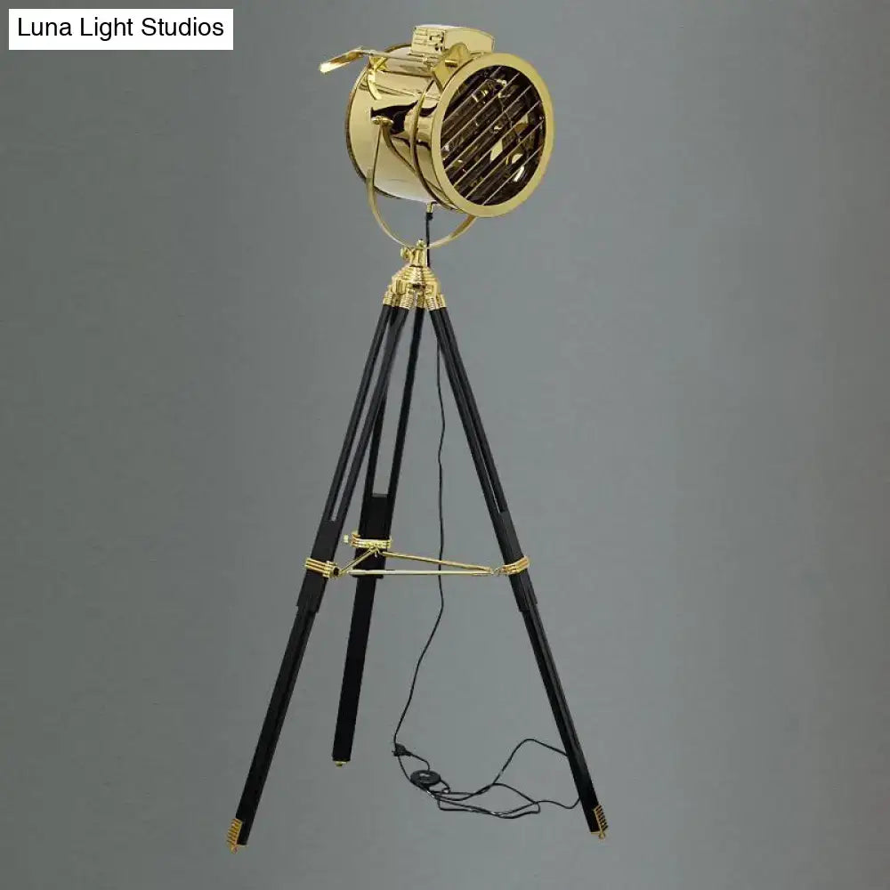 Tripod metal floor lamp with black legs and brass spotlight head, corded lighting Decorbites on Tampa Home & Garden Store
