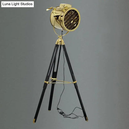 Tripod metal floor lamp with black legs and brass spotlight head, corded lighting Decorbites on Tampa Home & Garden Store